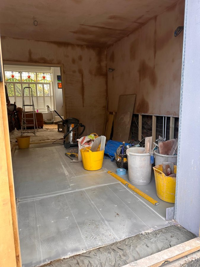Before: kitchen stripped back during renovation