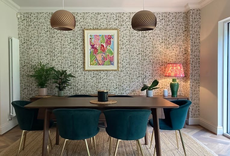 Fresh Start Living dining room design with patterned wallpaper, velvet chairs and statement lighting